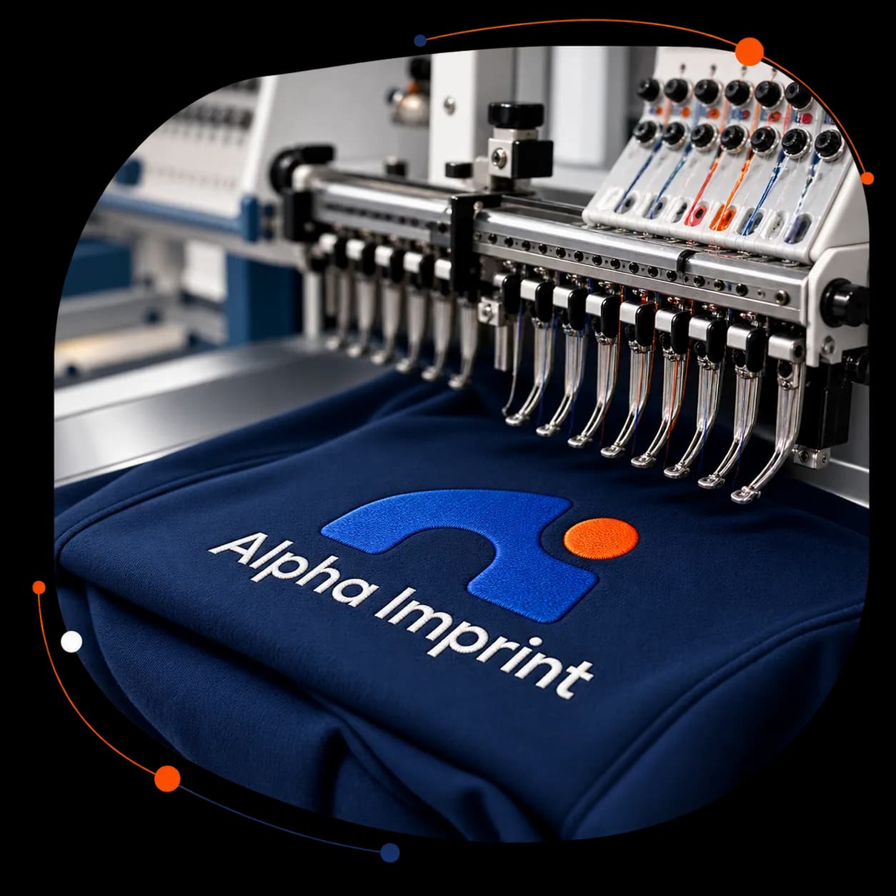 Embroidery machine decorating navy Alpha Imprint apparel